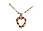 Heartfelt Elegance: Antique Gold Ruby Pendant