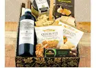 Delight your senses with our artisanal wine and cheese basket!